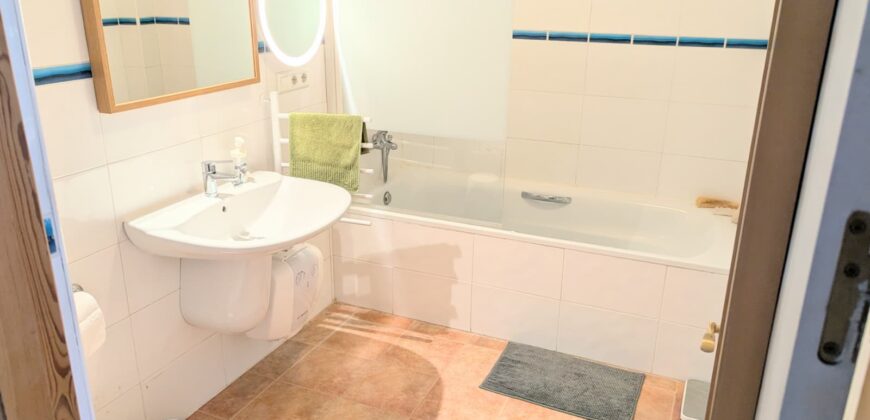 Elegant Energy-Efficient Village Residence with Exceptional Garage Space in Guaro