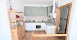 Elegant Energy-Efficient Village Residence with Exceptional Garage Space in Guaro