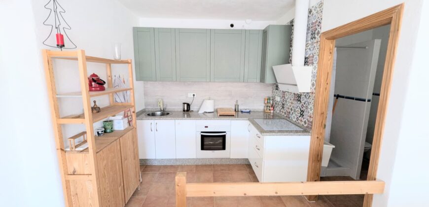 Elegant Energy-Efficient Village Residence with Exceptional Garage Space in Guaro