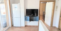 Elegant Energy-Efficient Village Residence with Exceptional Garage Space in Guaro