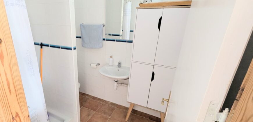 Elegant Energy-Efficient Village Residence with Exceptional Garage Space in Guaro