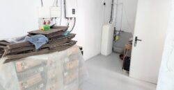 Elegant Energy-Efficient Village Residence with Exceptional Garage Space in Guaro