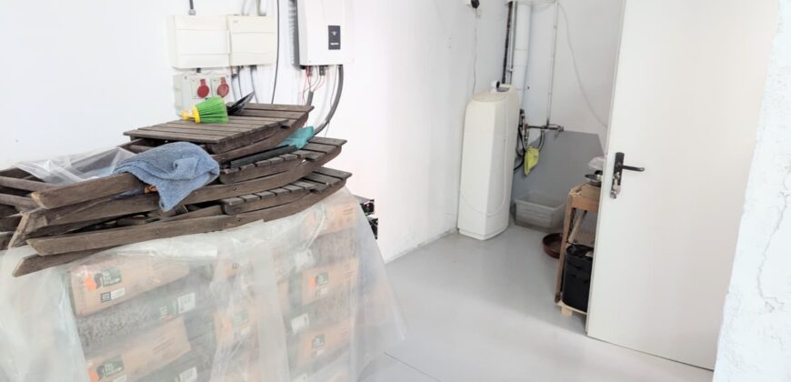 Elegant Energy-Efficient Village Residence with Exceptional Garage Space in Guaro