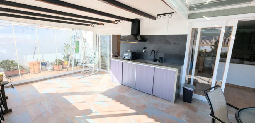 Elegant Energy-Efficient Village Residence with Exceptional Garage Space in Guaro