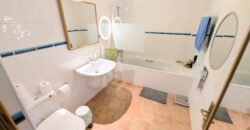 Elegant Energy-Efficient Village Residence with Exceptional Garage Space in Guaro