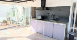 Elegant Energy-Efficient Village Residence with Exceptional Garage Space in Guaro